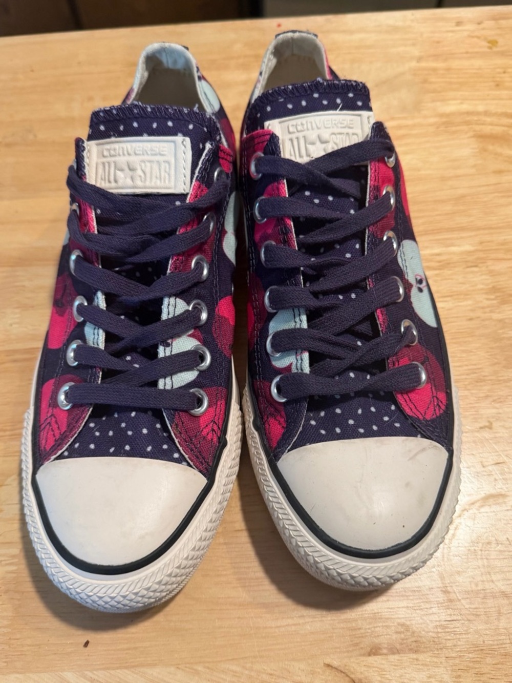 Converse Low Top Sneakers in Navy with Pink Accents